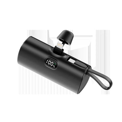 Capsule digital display wireless power bank showing battery percentage on screen, compact 79x34x26mm design with integrated plug