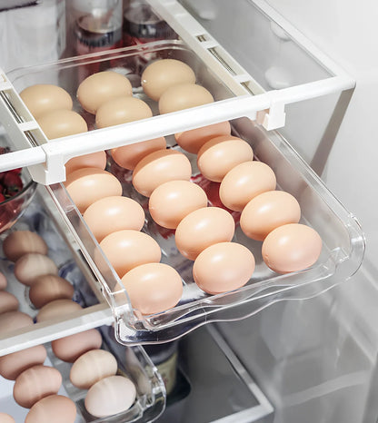 Transparent adjustable fridge egg storage rack with pull-out drawer holding 21 eggs, stackable for kitchen organisation
