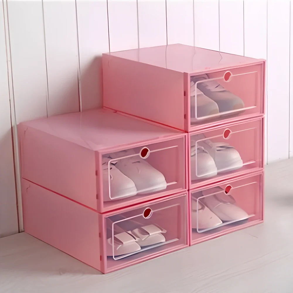 Transparent plastic shoe box showing stackable design and clear construction