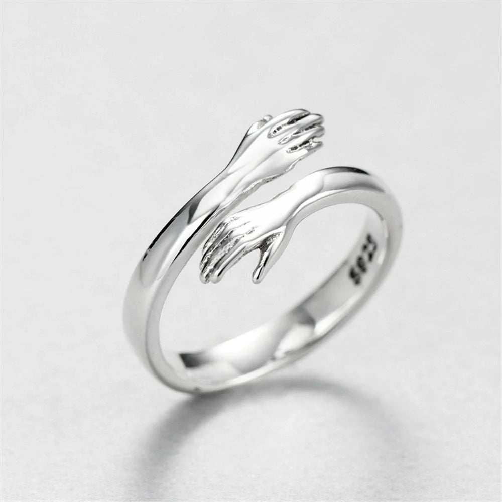 Sleek adjustable couple's ring made of premium brass and stainless steel, symbolizing the eternal embrace of love