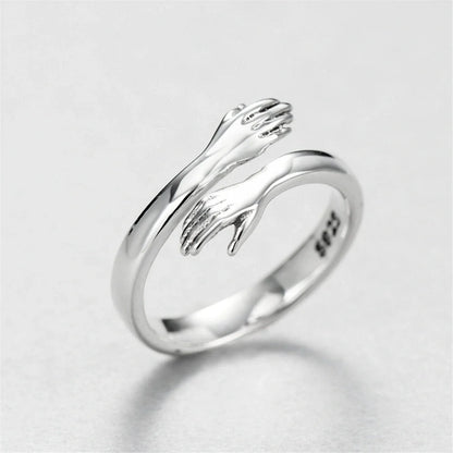 Sleek adjustable couple's ring made of premium brass and stainless steel, symbolizing the eternal embrace of love