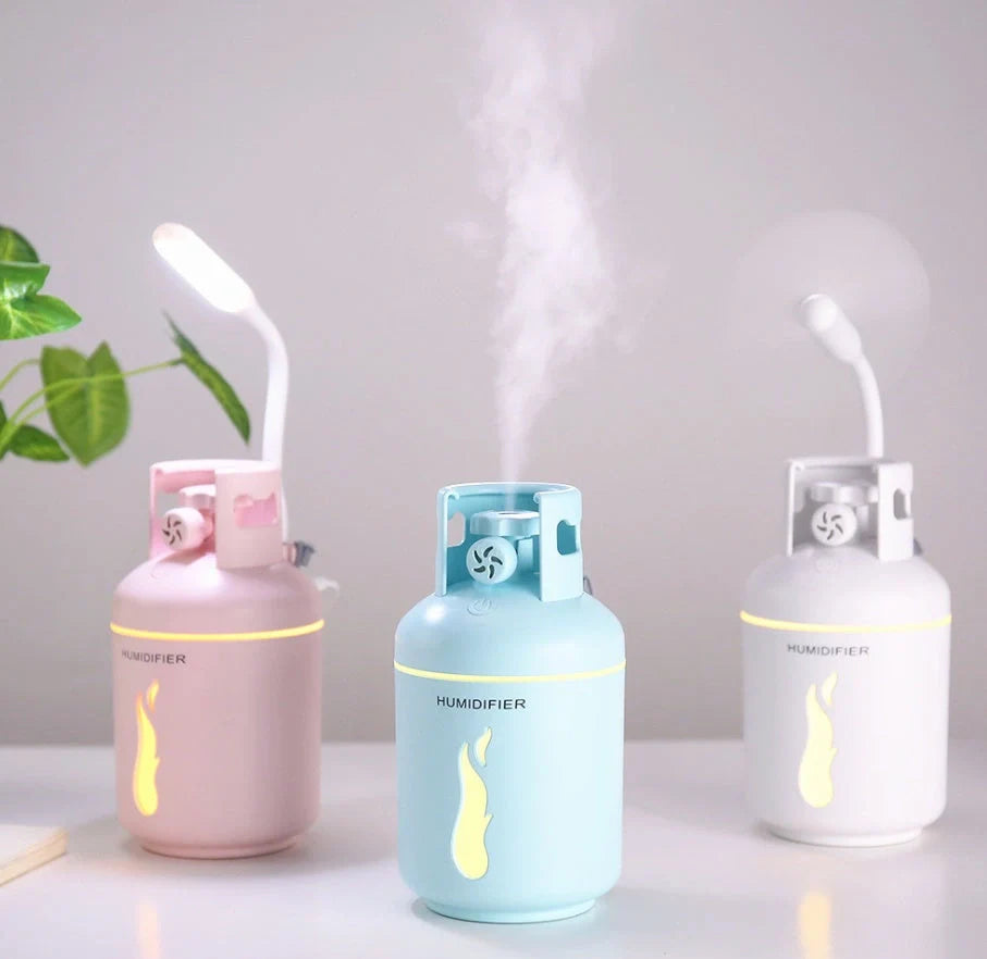 Compact USB-powered humidifier with 300ML water tank in pink, blue, or white