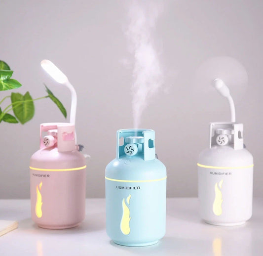 Compact USB-powered humidifier with 300ML water tank in pink, blue, or white