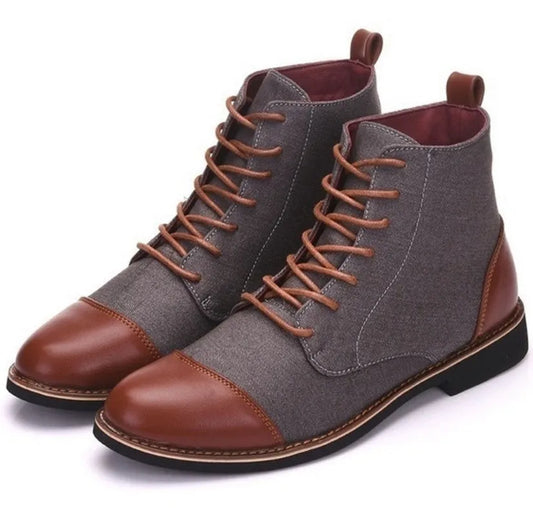 Men's leather boots with belt buckle details and rubber soles in black colour