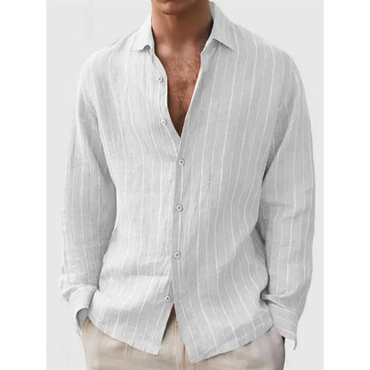 Man wearing a loose striped cardigan-style shirt with short sleeves.