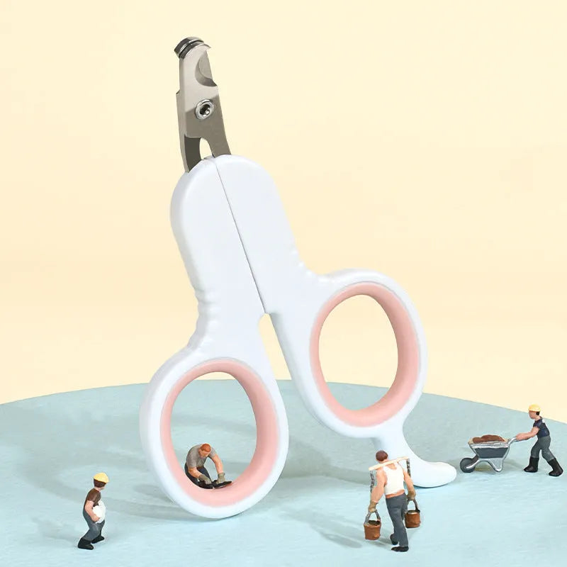 Professional grey pet nail clippers with curved safety tips and a rubberised ergonomic handle on a white background.