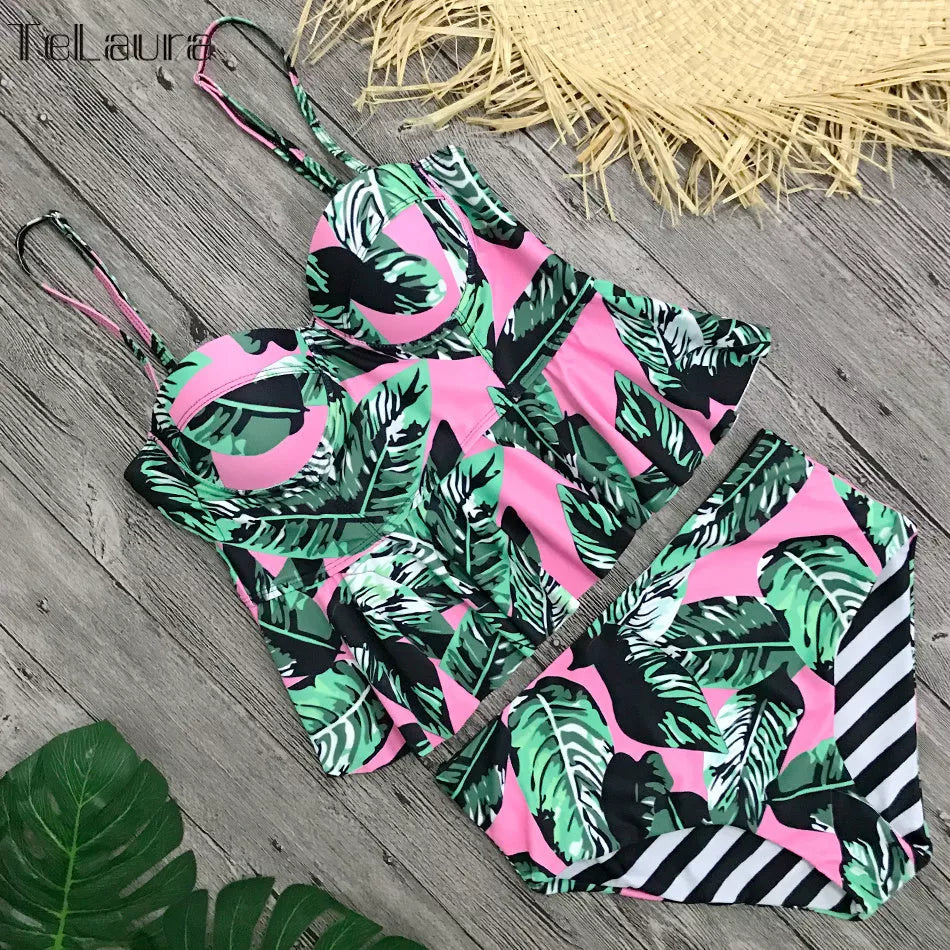 Women's floral high waisted push up bikini in vibrant colors, perfect for beach outings.
