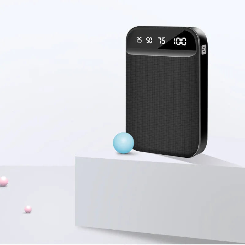 Mini power bank in black with dimensions 93x63x22mm showing USB ports for charging devices