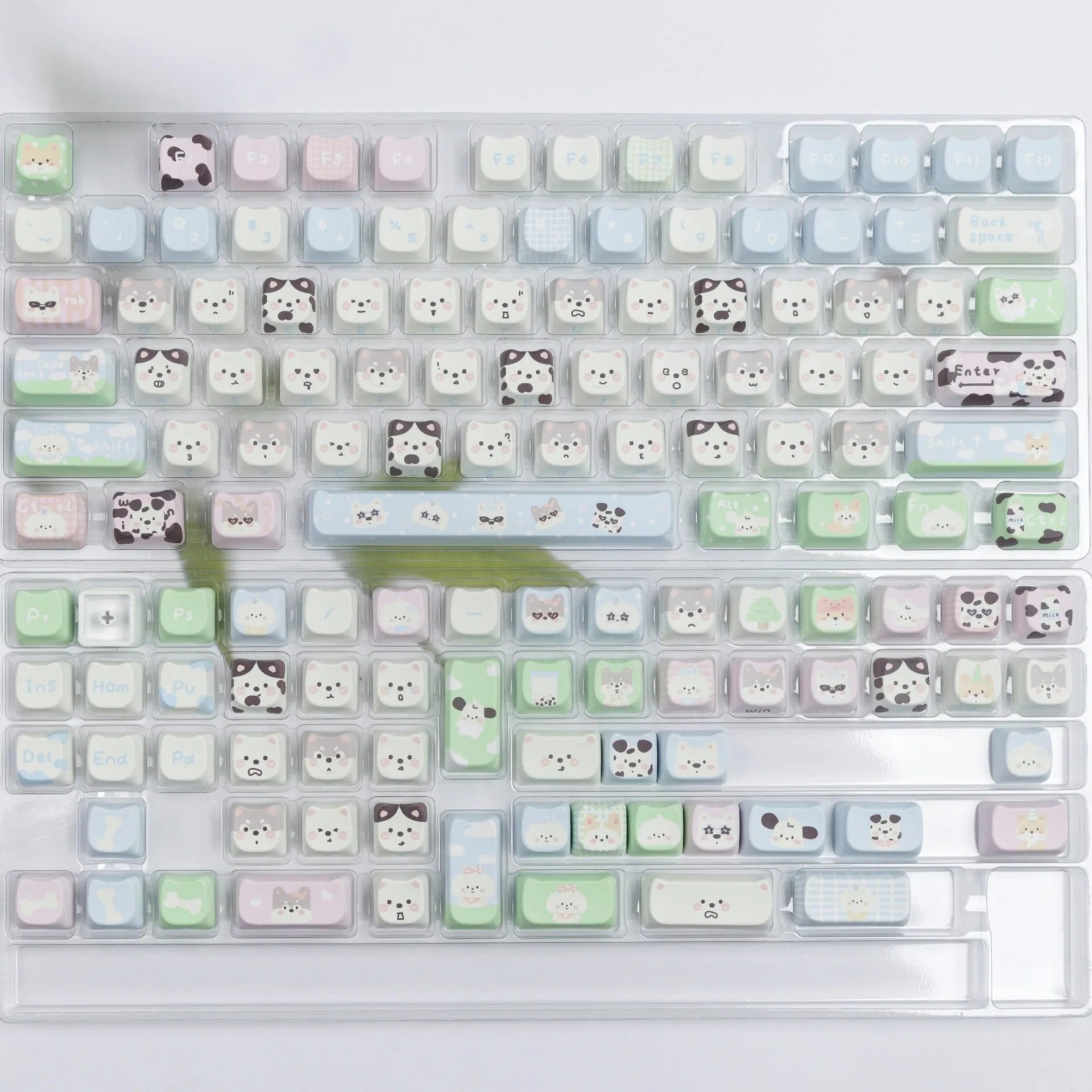 Full set of PBT key caps with sublimated cat and puppy design for mechanical keyboards.