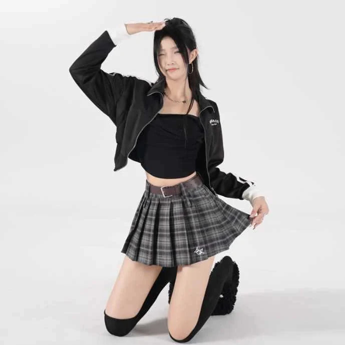 High-waisted cotton A-line skirt with pleated design in black plaid pattern, showing spandex blend stretch and A-line silhouette
