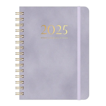 A5 size PU leather notebook with metal coil binding in a choice of colours including black, blue, and brown.