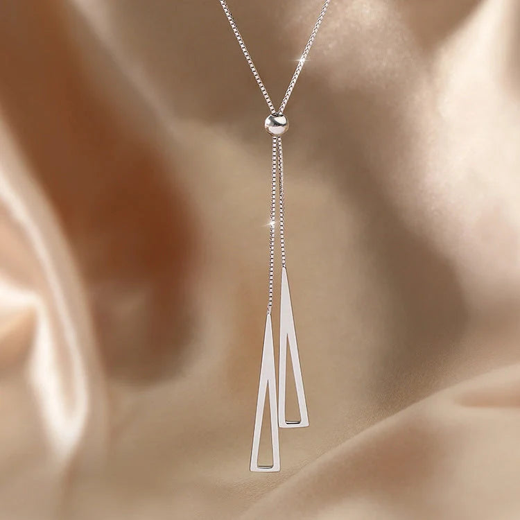 Sterling silver geometric triangle necklace with adjustable clavicle chain in white K