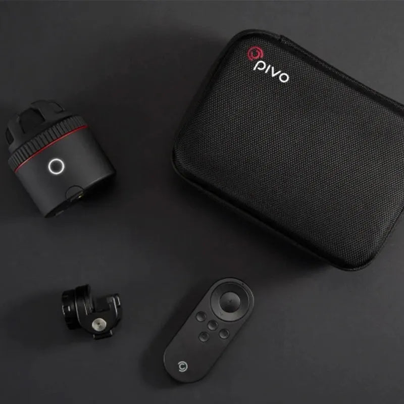 Black PIVO facial tracking camera with a smartphone mounted on its 360-degree rotating base.