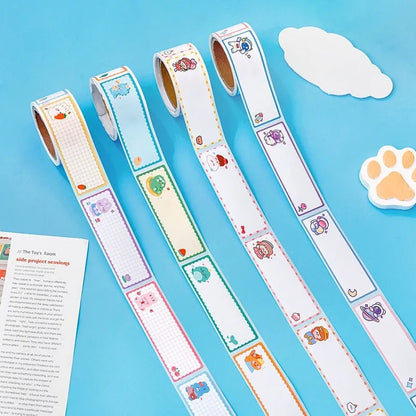 Roll of student name tape stickers with cartoon dinosaur, astronaut, rabbit, and girl designs for labelling
