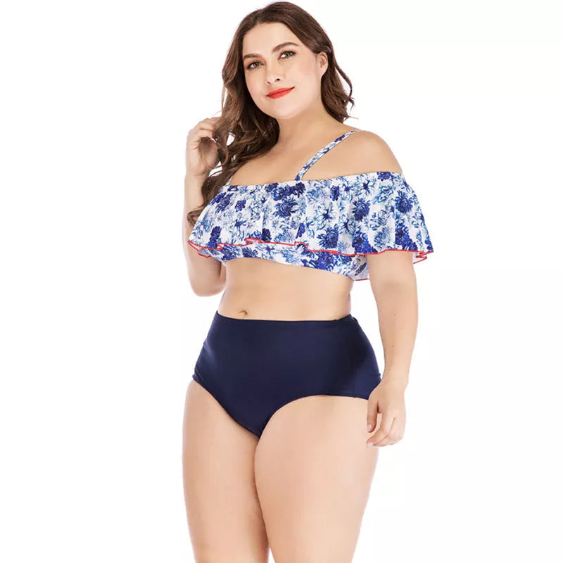 Women's printed plus size swimsuit in vibrant design, sizes XL to 4XL