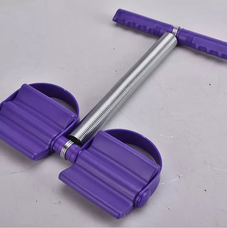 Spring pedal puller in purple, compact fitness equipment for muscle training