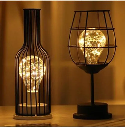 Minimalist hollow iron table lamp with warm white LED light in red wine glass design