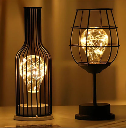 Minimalist hollow table lamp in red wine bottle design with wrought iron construction and warm white LED illumination