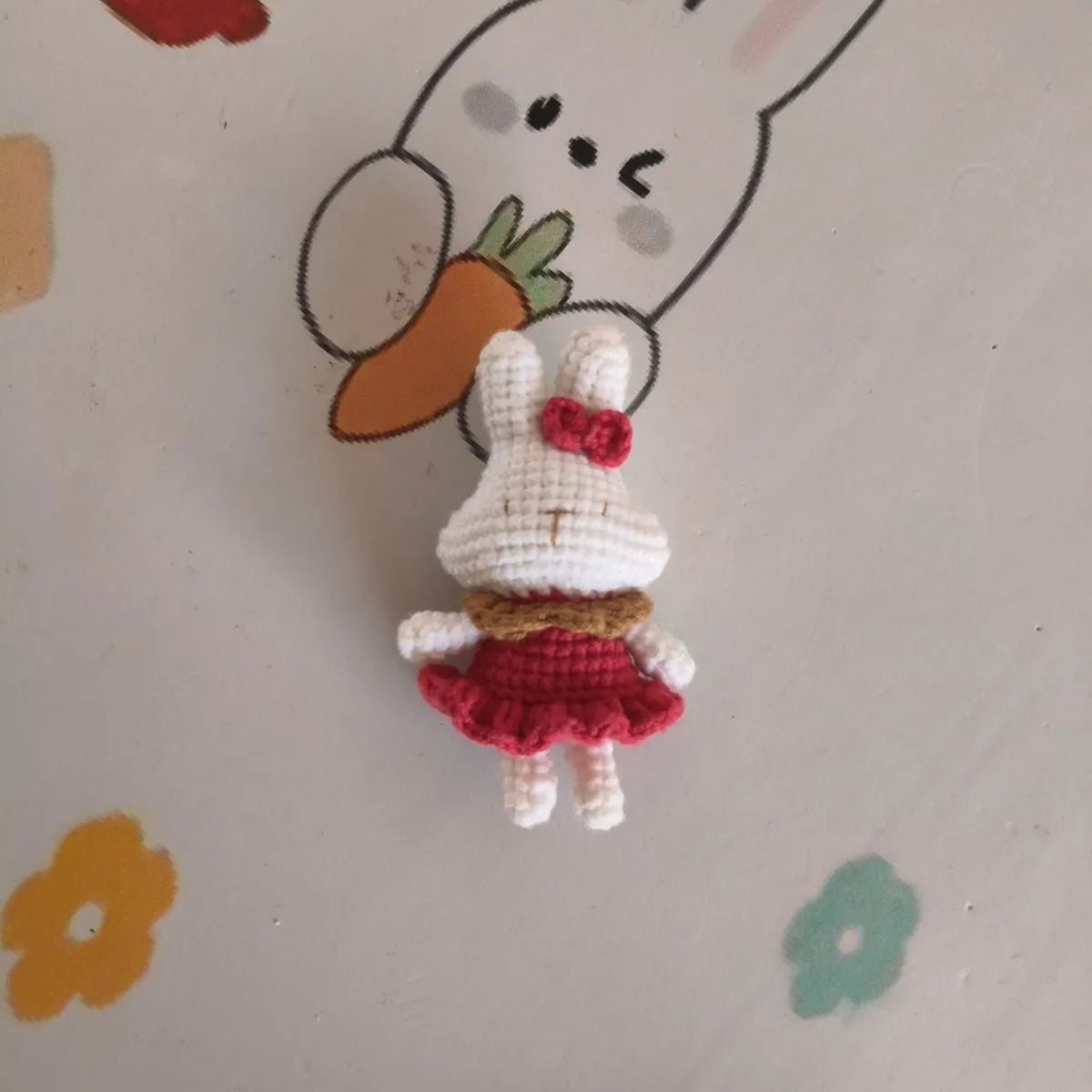 Hand-crocheted wool yarn rabbit keychain pendant with decorative design