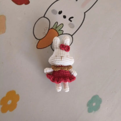 Hand-crocheted wool yarn rabbit keychain pendant with decorative design