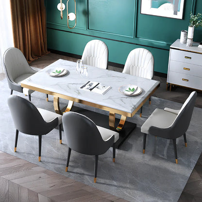 Modern slate dining table with marble finish and metal frame, rectangular shape with choice of pineapple or round-back chairs
