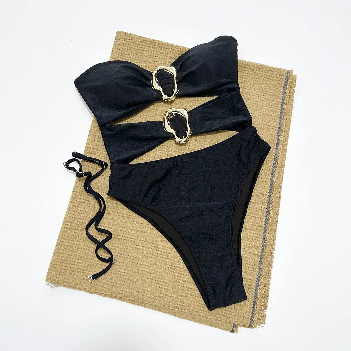 Women's solid colour one-piece swimsuit in black, brown, or red with nylon spandex lining, sizes S M L