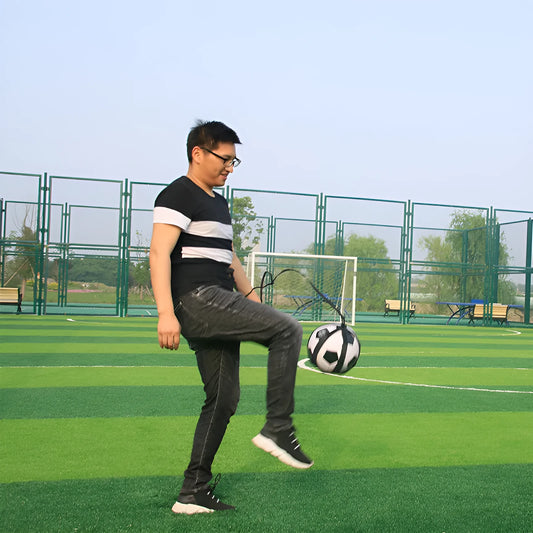 Black static football juggling belt with 2m length made from diving suit fabric on grass