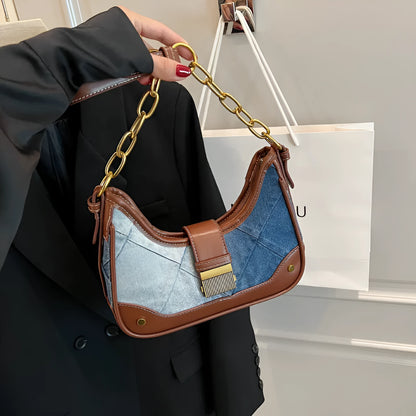 Brown denim women's bucket shoulder bag with diamond mesh detail and chain straps