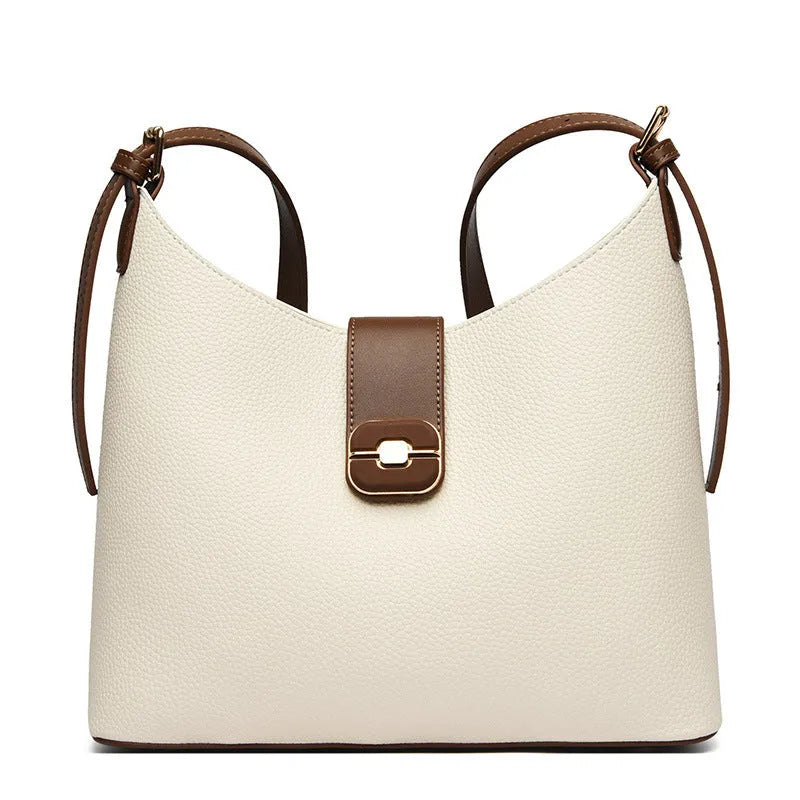 PU bucket shoulder bag in biscuit colour showing internal phone compartment and zippered sections
