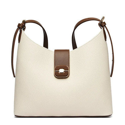 PU bucket shoulder bag in biscuit colour showing internal phone compartment and zippered sections