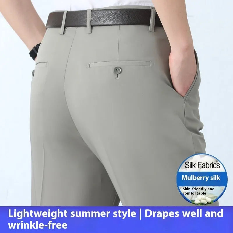 Men's dark blue high-waisted straight-leg non-ironing trousers made from a silk blend fabric.