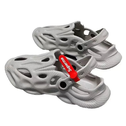 Coconut slippers with closed toe design in EVA material available in grey, black, white, and khaki colours