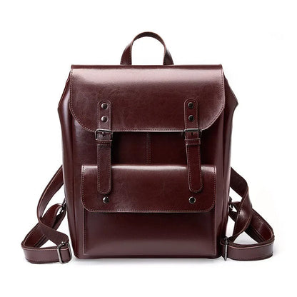 Genuine cowhide leather backpack for women in black, brown, or coffee, showing hard-textured two-layer construction.