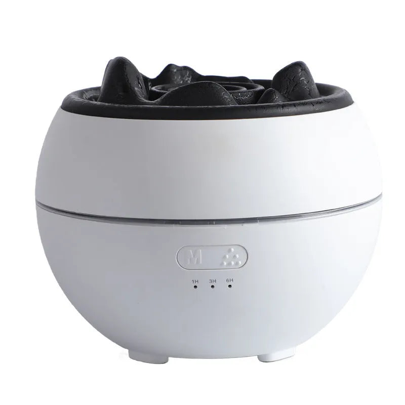 White flame aroma diffuser humidifier with round shape on wooden desk