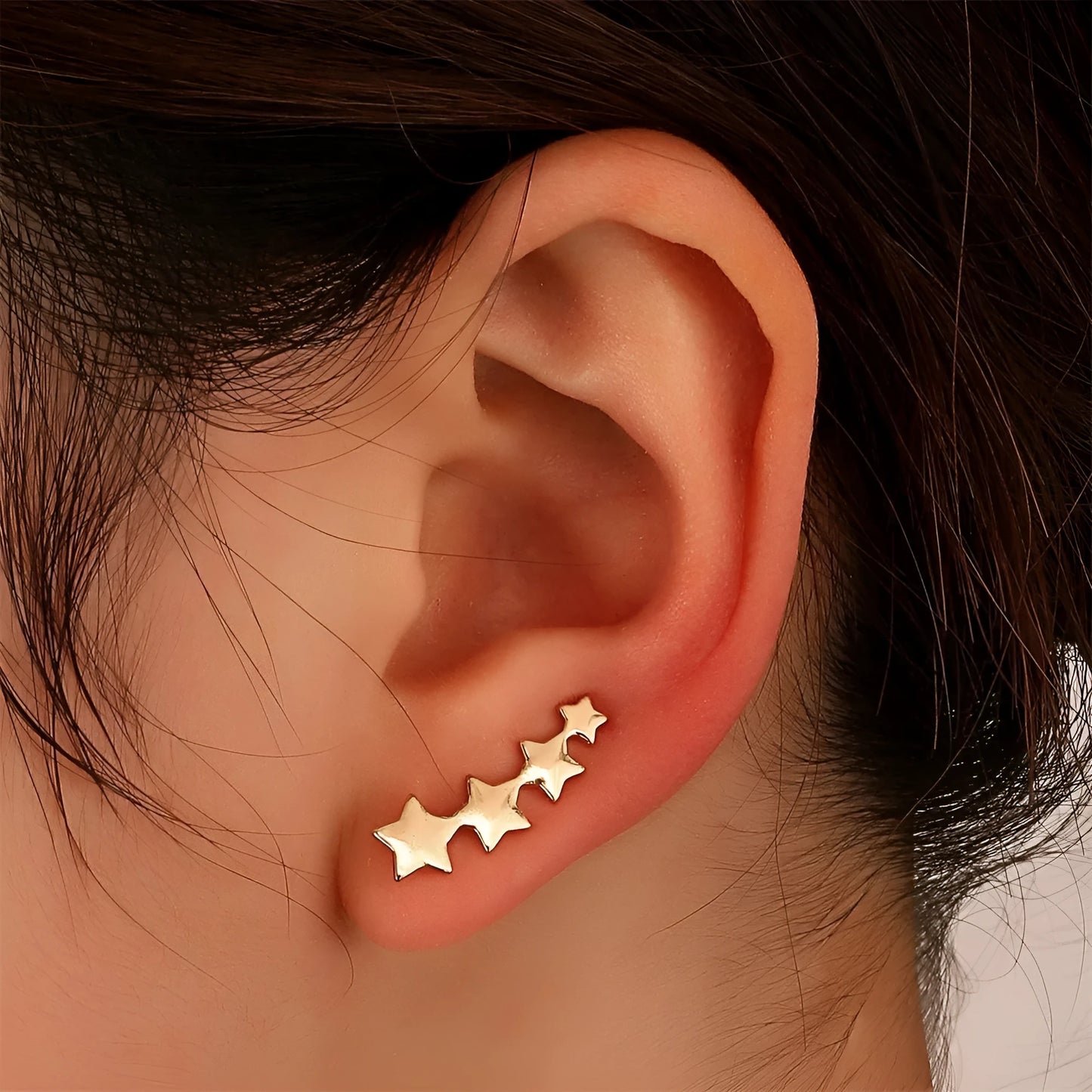 A pair of copper leaf-shaped clip-on earrings for women, KC Gold Star A896 finish.