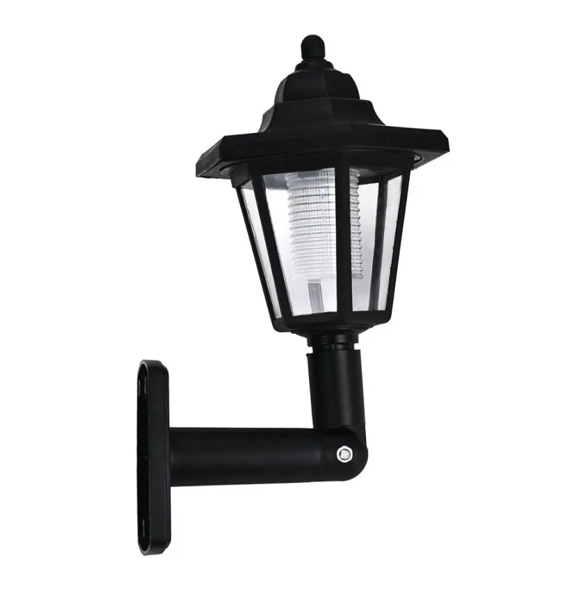 Black hexagonal solar-powered wall lamp for outdoor garden or patio lighting
