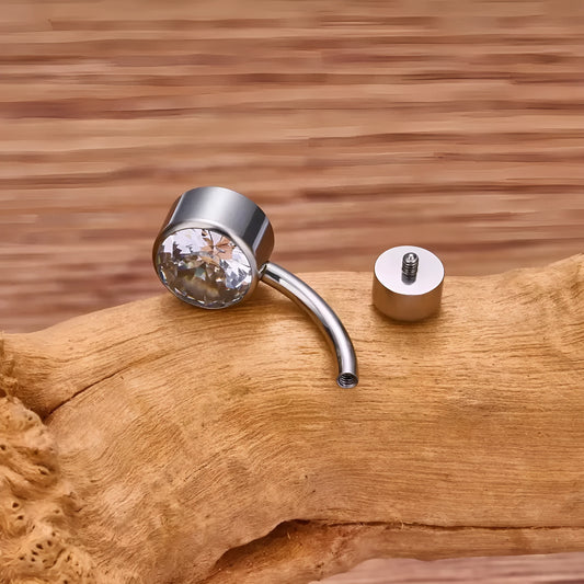 Titanium alloy double-headed navel stud with zircon stones in various colours and lengths.