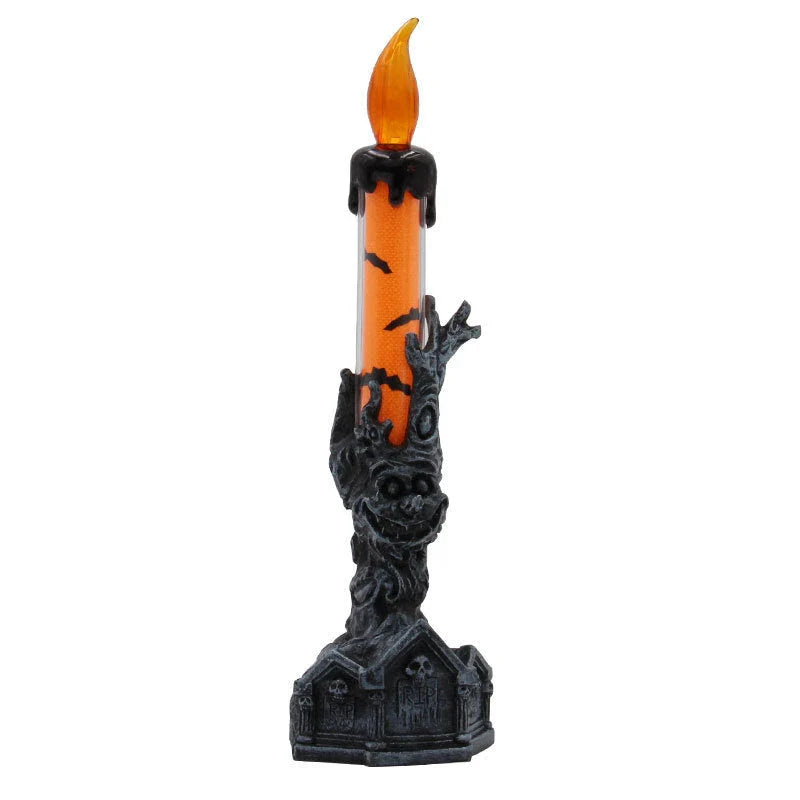 Spooky Halloween LED candle decoration with quirky hand-holding design and warm white lighting