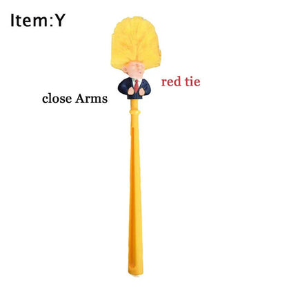 Comical Donald Trump-themed toilet brush made of durable plastic with a bold yellow color and convenient hanging slot