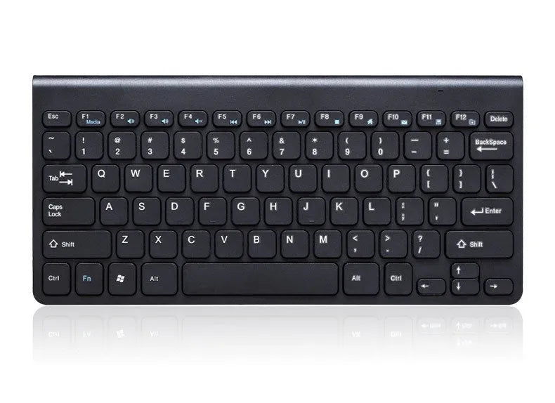 Black and white wireless keyboard and mouse set on a desk with 4G dongle