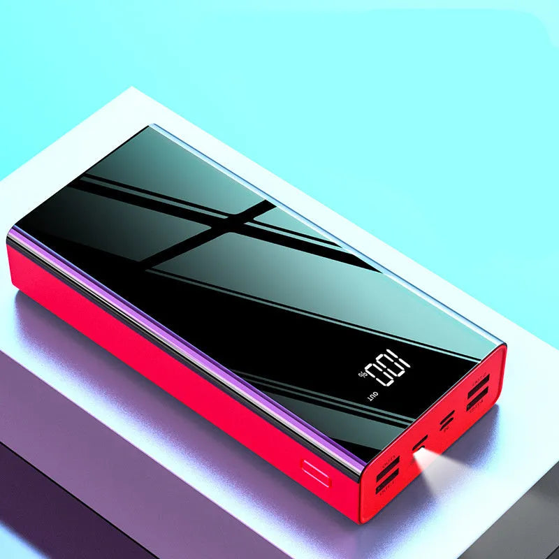 Large black and red 40000 mAh power bank with LCD display showing battery percentage