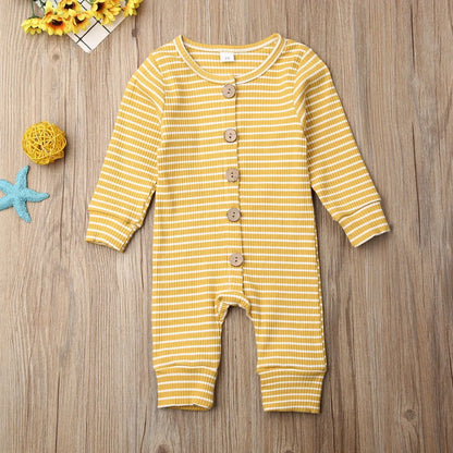 Newborn wearing a striped knitted jumpsuit in cotton, sizes 70-100cm, available in six colours