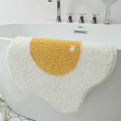 Stylish and functional egg-shaped area rug with a playful design, perfect for adding charm and protecting floors in your home.