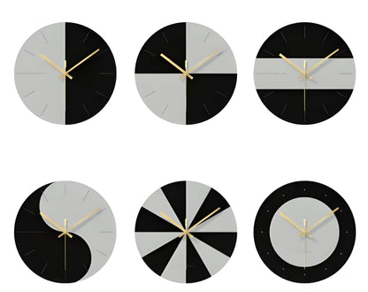 A large, clear tempered glass wall clock with a minimalist transparent face on a light background.