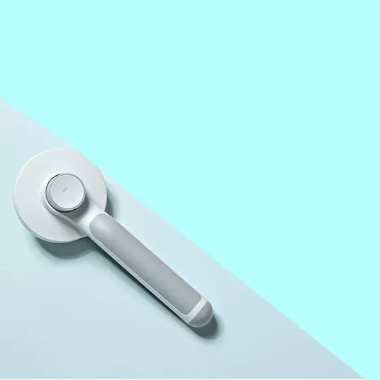Round Handle Pet Passage Comb with stainless steel needles and self-cleaning feature