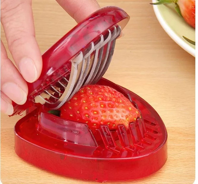 Red Strawberry Slicer with stainless steel blades for even fruit slices