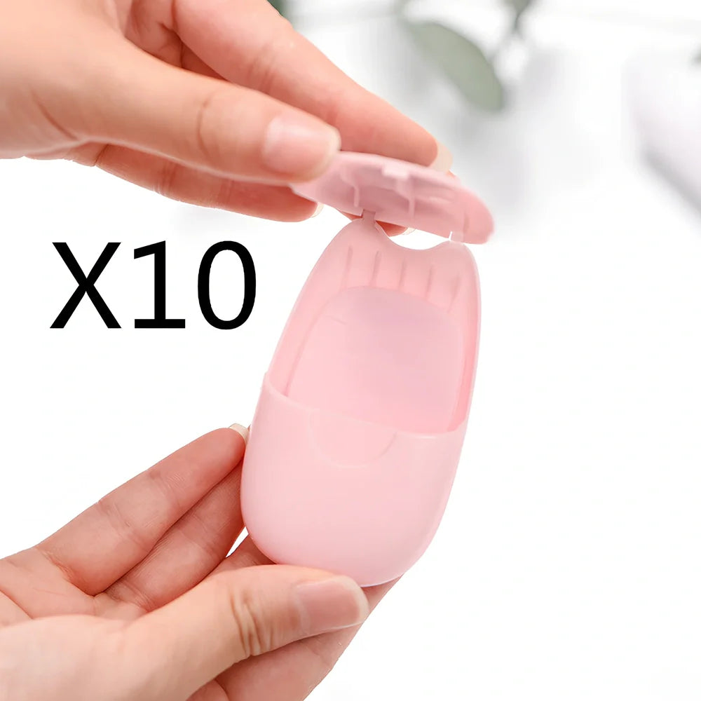 Pack of 50 pink biodegradable soap paper sheets, each 8x4.5cm, for portable hand cleaning on travels