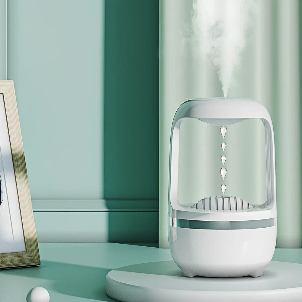 White anti-gravity humidifier showing upward water droplets with 500ml tank and USB-C cable