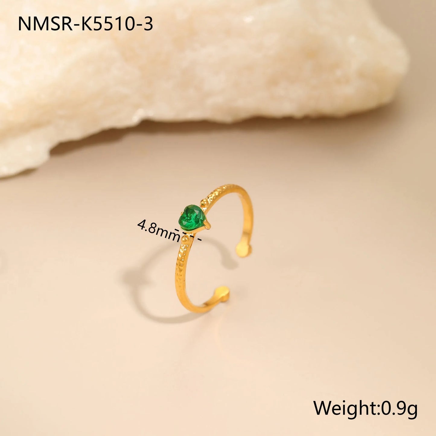 Open-ended stainless steel ring with geometric love heart shape and inlaid green zircon stone.