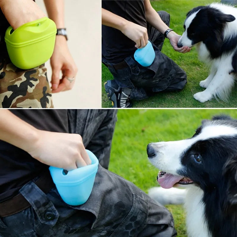 Black silicone dog training treat pouch with clip and magnetic closure shown attached to a belt.